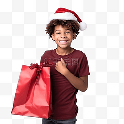 拎袋子图片_戴着圣诞帽的非洲裔美国男孩，在