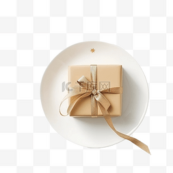 圣诞餐桌布置，白桌上的盘子上放