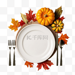 叶盘子图片_感恩节餐桌布置，配有南瓜和彩色
