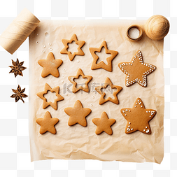 圣诞节饼干人图片_烤纸上的生姜面包形状和饼干为圣