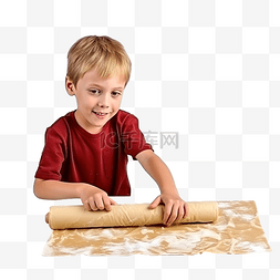 孩子用的桌子图片_一个男孩用擀面杖在桌子上擀圣诞