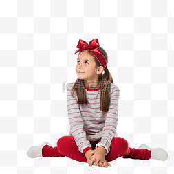 圣诞节假期里的女孩坐在地板上站