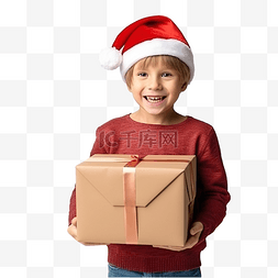 戴圣诞帽的男孩图片_一个戴着圣诞帽和睡衣的小男孩站
