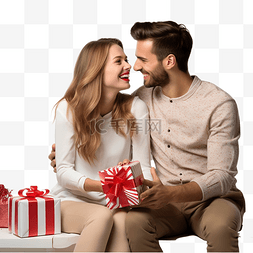 年轻快乐的夫妇带着礼物坐在圣诞