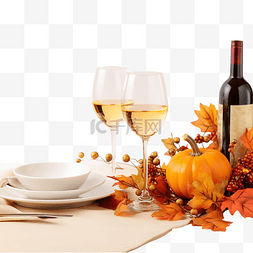 秋季装饰品图片_餐桌上供应感恩节晚餐，配有餐具