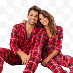男人和宠物图片_穿着圣诞格子红色睡衣的夫妇坐在