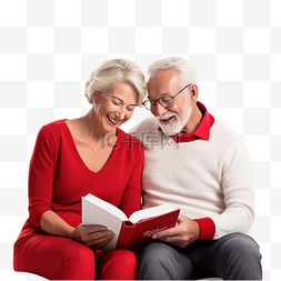 一对老情侣图片_老夫妇坐在圣诞树旁一起读书