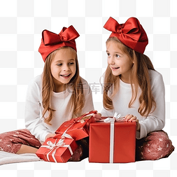 微笑的女孩坐著图片_两个扎着辫子戴着圣诞红帽带着礼