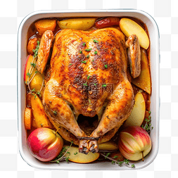 火鸡大腿用香料和苹果在烤箱中烘