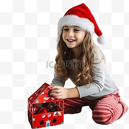 一个在家的图片_一个戴着圣诞老人帽子的女孩在家