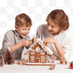 小男孩和妈妈一起装饰圣诞姜饼屋