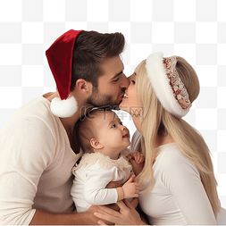 孩子爸爸妈妈图片_父母在装饰好的圣诞房间里亲吻他