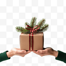 手拿着圣诞礼品盒和带圣诞装饰的