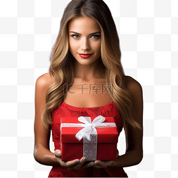 惊喜礼品一份图片_穿着红色圣诞礼服的女性手里拿着