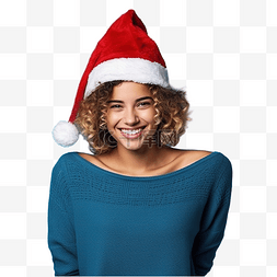 幸福满足图片_在孤立的蓝墙上戴着圣诞帽的女孩