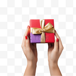 女系列图片_女手在木质表面包裹圣诞礼物和彩