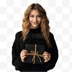 女孩生日礼物图片_穿黑色羊毛毛衣的女孩拿着用纸包