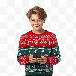 穿着圣诞毛衣拿着电话的少年男孩