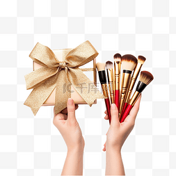 手拿化妆盒图片_女手拿着化妆刷和色调霜靠近圣诞
