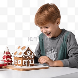 圣诞老人做饭图片_戴着圣诞老人帽子的男孩精心装饰