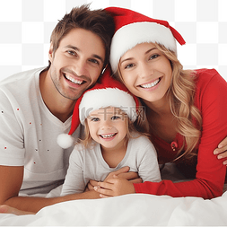 家庭享受图片_圣诞节期间，幸福的家庭在床上使