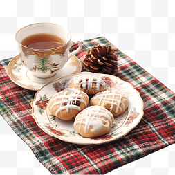 一杯茶和饼干图片_盘子上的圣诞礼物和格子上的一杯