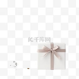 白红礼盒图片_木桌上白盒子里的圣诞礼物，上面