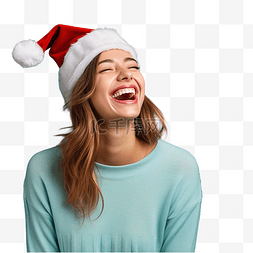搞笑人图片_戴着圣诞帽的女孩在孤立的蓝墙上