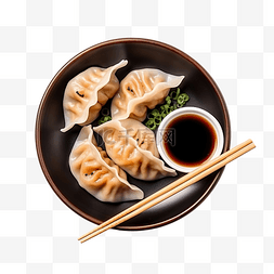 冰箱存储食品图片_黑盘酱油和筷子上的饺子食品