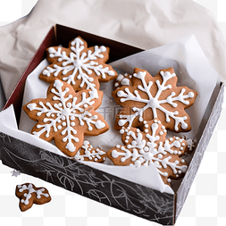 手工风格图片_灰桌上礼品盒里的圣诞自制姜饼