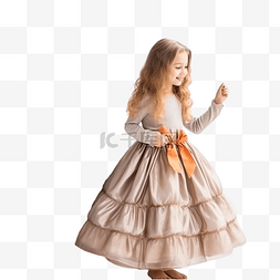 礼服小女孩图片_穿着节日礼服的漂亮小女孩站在圣