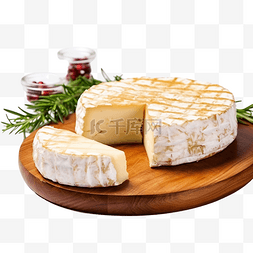餐桌布格子布图片_木桌上烤的布里奶酪圣诞晚餐