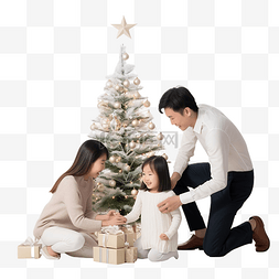 金色一家三口图片_亚洲三口之家一起装饰圣诞树，在