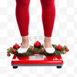 少女的身体图片_女脚站在电子秤上，穿着圣诞装饰
