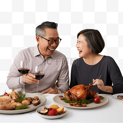 中年家庭图片_越南中年夫妇在家吃圣诞晚餐时给
