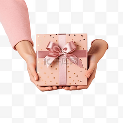 粉色礼盒礼包图片_女孩手拿着牛皮纸礼盒，作为圣诞