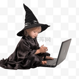 计算机孩子图片_万圣节穿着女巫服装的小男孩使用