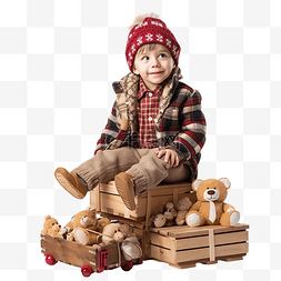 下雪开心的孩子图片_带着圣诞礼物盒的小男孩坐在木制