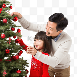 快乐的亚洲父亲和女儿装饰圣诞树