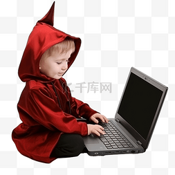 计算机孩子图片_万圣节穿着魔鬼服装的小男孩使用