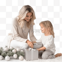 可爱的妈妈和金发小女儿在圣诞树