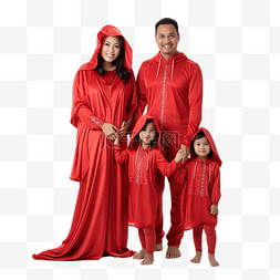 一家人穿着红色服装庆祝圣诞节之