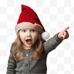 圣诞指向图片_庆祝圣诞节的小女孩专注于一项任