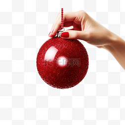 发光红球图片_女手拿着闪闪发光的红色圣诞树小