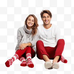 快乐的年轻夫妇双脚并拢躺在地板