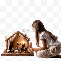 耶稣祈祷图片_女孩正在看圣诞节耶稣诞生的场景