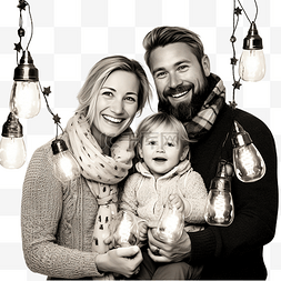 黑白一家人图片_拿着灯笼在圣诞树上摆姿势的幸福