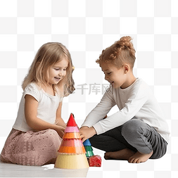 女孩和男孩在地板上玩锥体来装饰