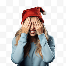 遮住图片_戴着圣诞帽的女孩，戴着孤立的蓝