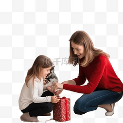 妈妈正在帮助她的小儿子装饰圣诞